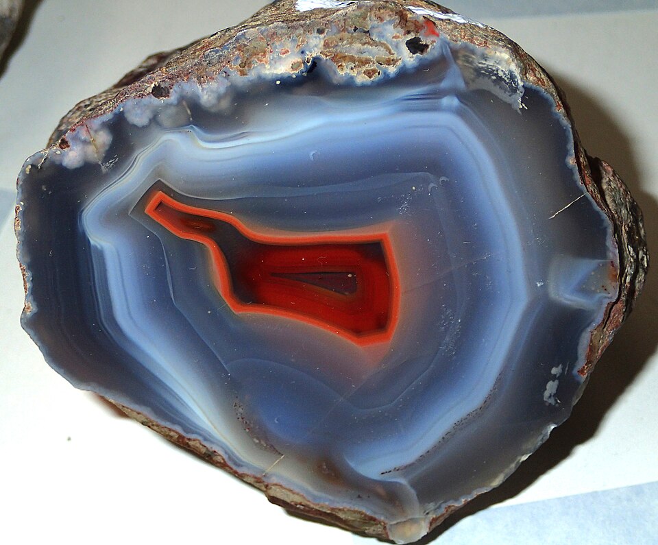 A polished slice of banded agate