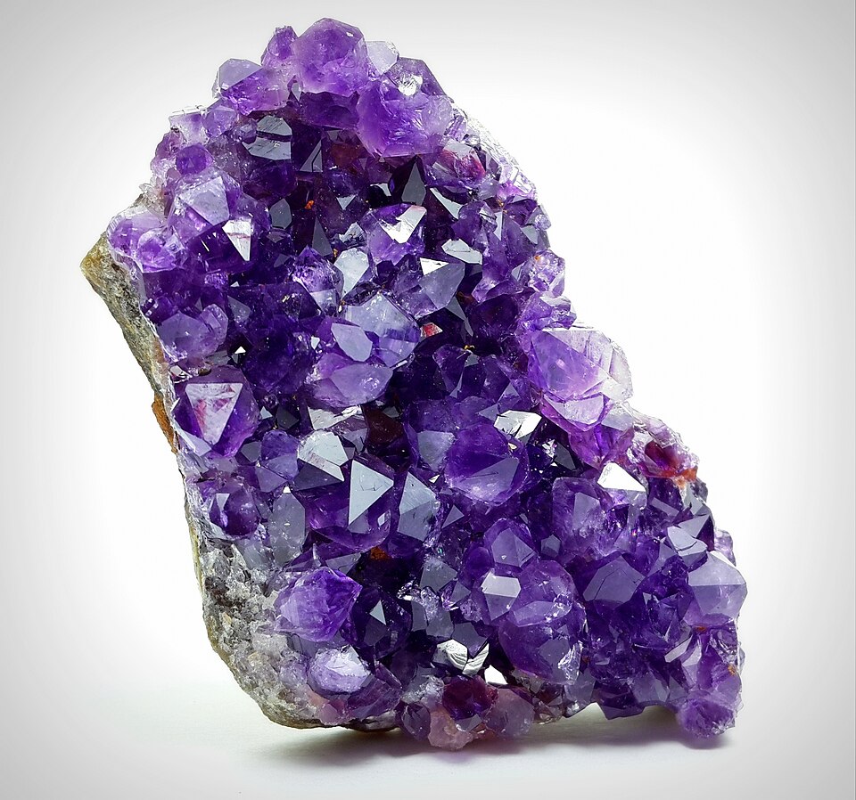 A cluster of purple amethyst crystals